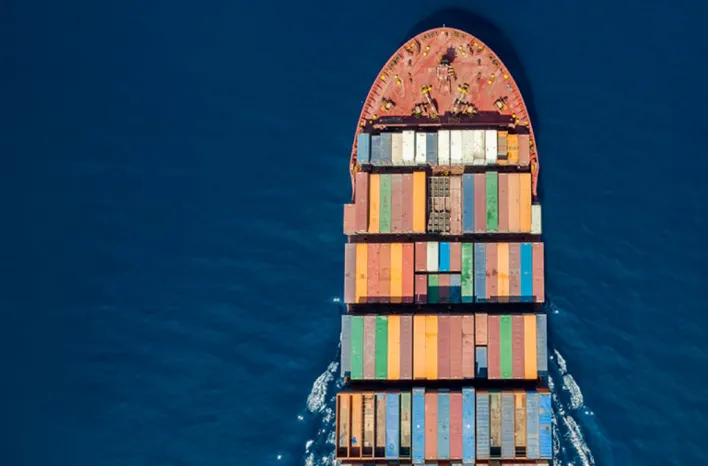 Aerial view of a container ship loaded with shipping containers