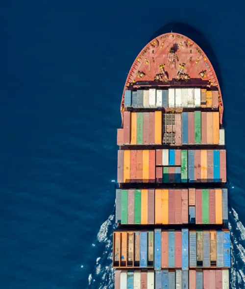 Aerial view of a container ship loaded with shipping containers